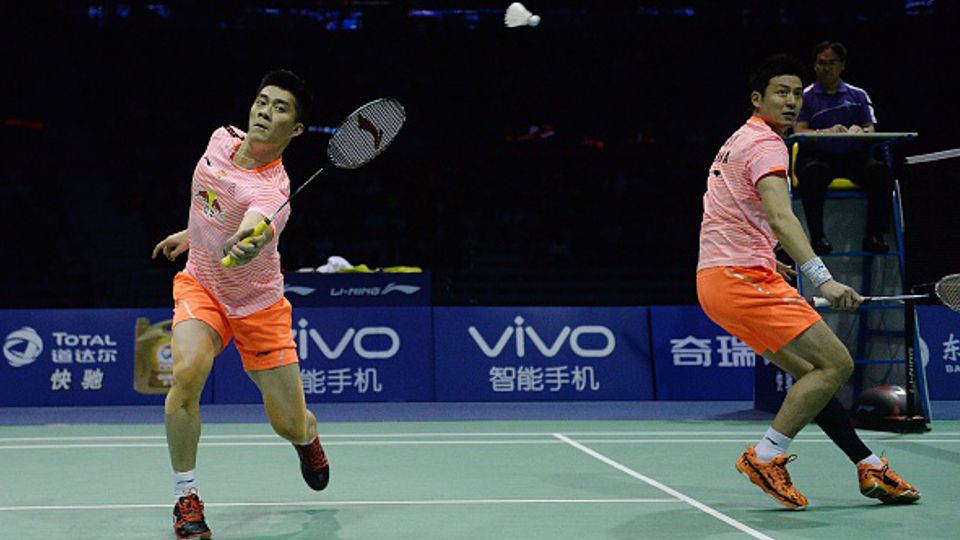 Keputusan Federasi BUlutangkis Dunia (BWF) menunda kompetisi Malaysia Open 2021 pada Jumat (07/05/21) merugikan ganda putra China di Olimpiade Tokyo 2020. Copyright: © GETTY IMAGES